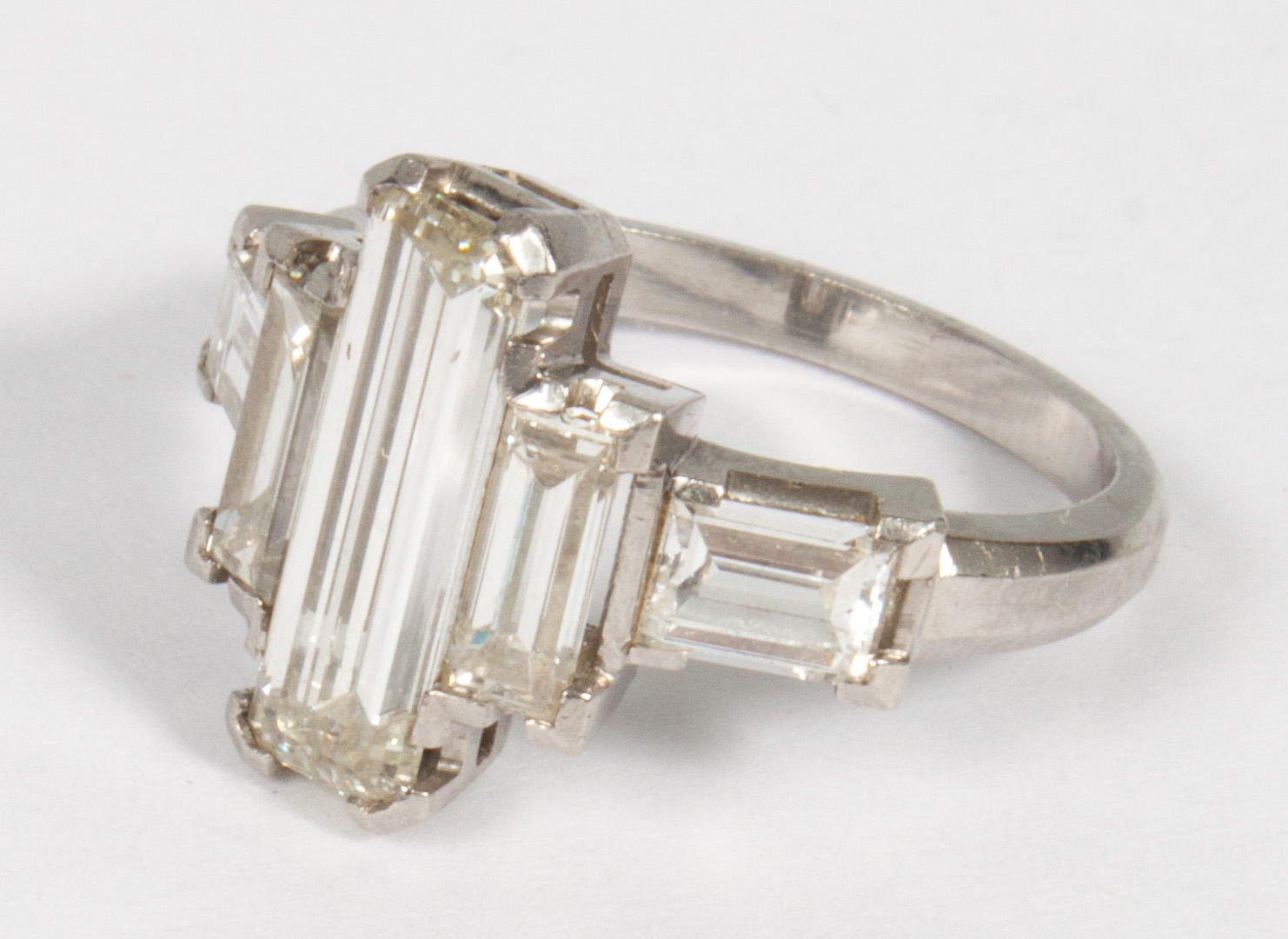 Appraisal: Lady's Platinum and baguette-cut diamond ring centering an elongated diamond