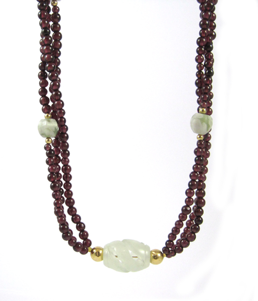 Appraisal: GARNET AND PEACE JADE TRIPLE STRAND NECKLACE measuring - inches