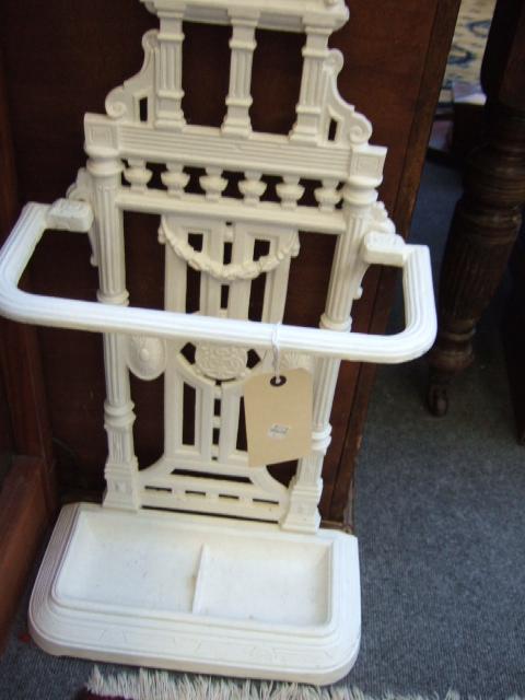 Appraisal: A white painted Victorian cast iron stick stand of Aesthetic