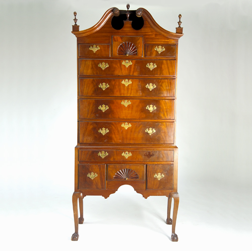 Appraisal: American bonnet-top mahogany highboy with eleven burl veneer drawers cabriole