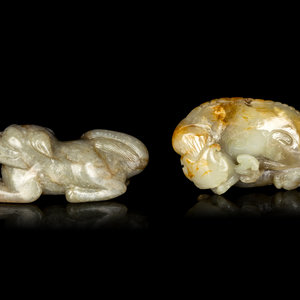 Appraisal: Two Chinese Pale Celadon Jade Figures of Recumbent Beasts TH