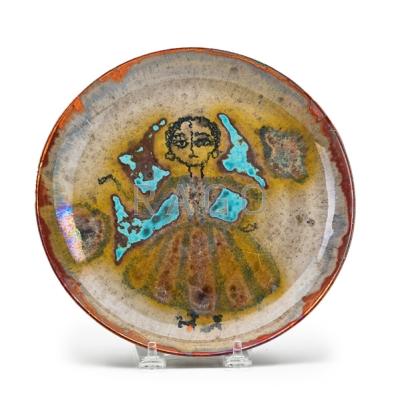 Appraisal: BEATRICE WOOD - Small glazed earthenware plate decorated with figure