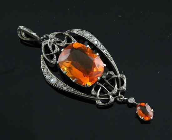 Appraisal: A stylish Edwardian rose diamond and orange paste drop pendant