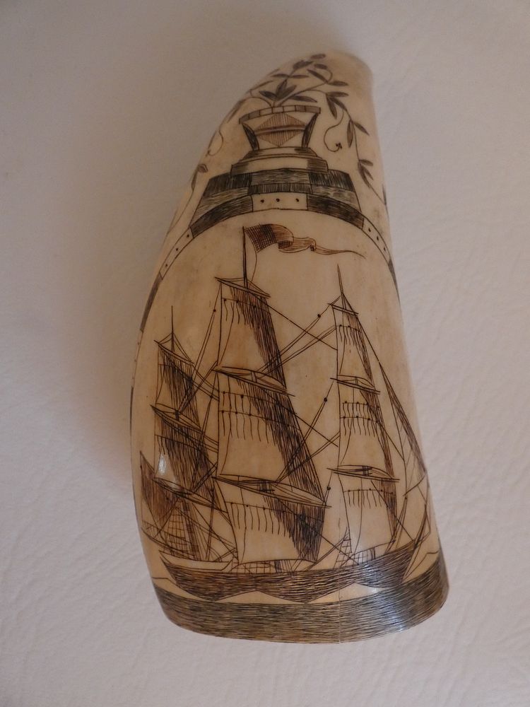 Appraisal: NANTUCKET WHALER TOOTH - R SPRING Scrimshaw whale tooth with