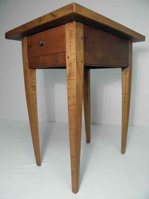 Appraisal: A small Maple finished shaker style side table with single