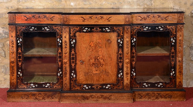 Appraisal: A VICTORIAN FIGURED WALNUT AND MARQUETRY INLAID BREAK FRONT SIDE