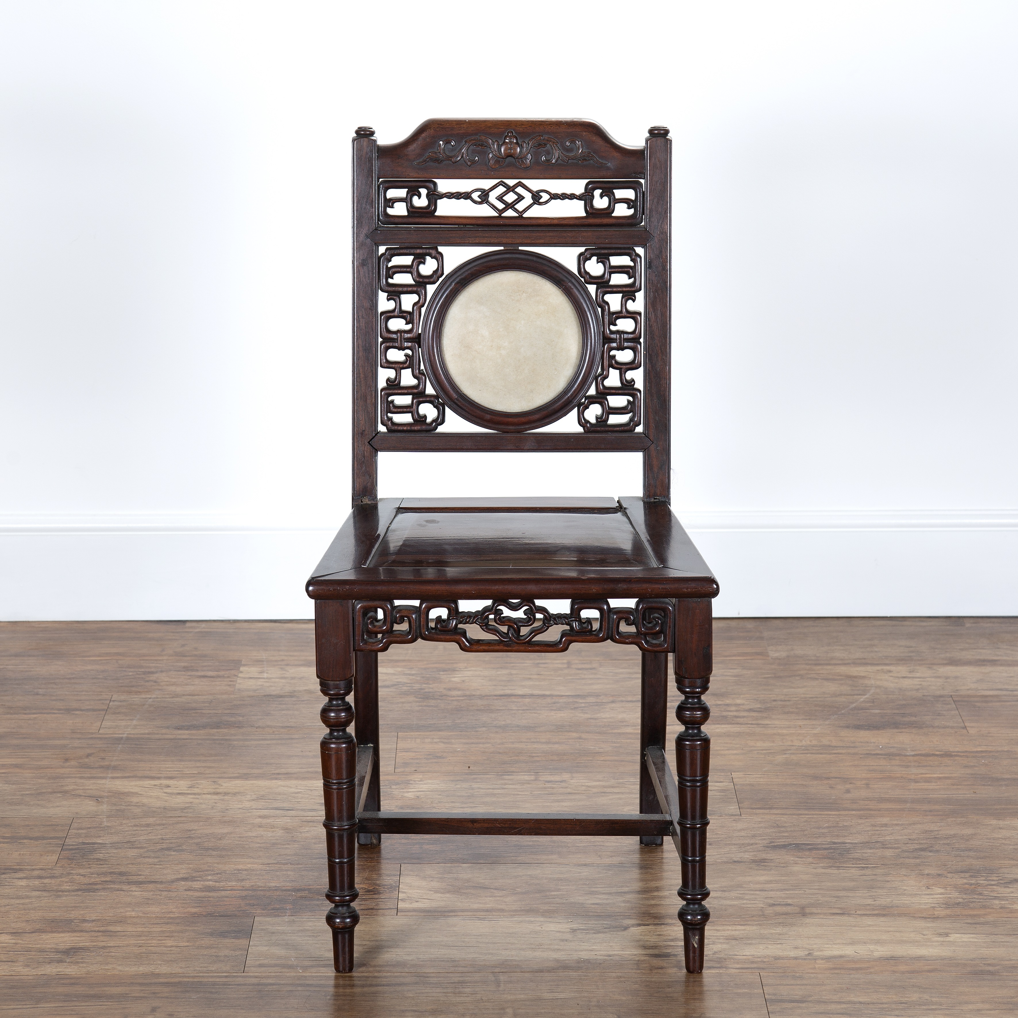 Appraisal: Rosewood side chairChinese circa with marble inset the back carved