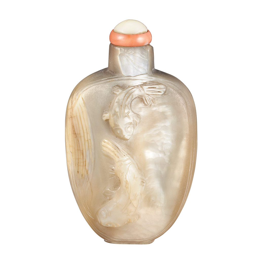 Appraisal: Chinese Mother-of-Pearl Snuff Bottle th Century The ovoid shape carved