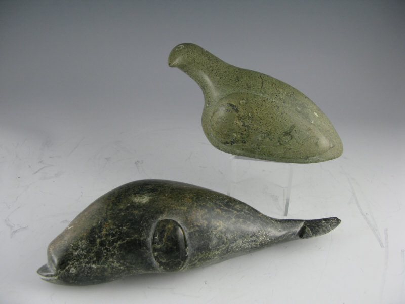 Appraisal: Two Inuit Soapstone Carvings the first is a green soapstone