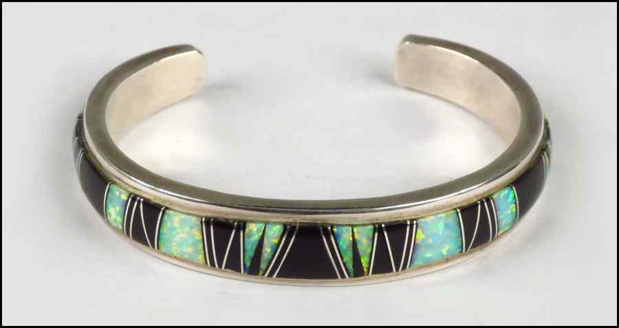 Appraisal: ONYX OPAL AND STERLING SILVER BRACELET Condition No Specific Condition