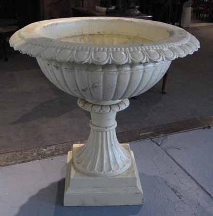 Appraisal: Large pair of Neoclassical style painted iron garden urns The