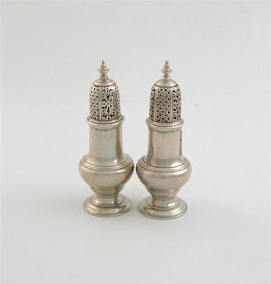 Appraisal: A pair of George II large baluster pepper casters high