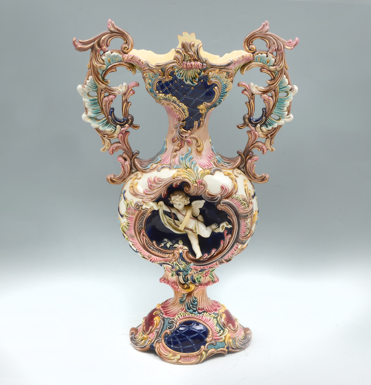 Appraisal: EICHWALD MAJOLICA VASE Large Majolica vase having an overall scrolling