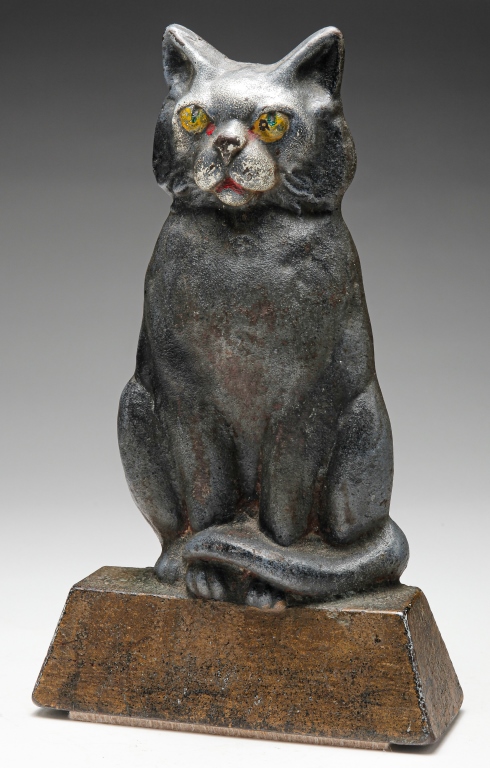 Appraisal: AMERICAN CAT DOOR STOP Early th century cast iron Seated