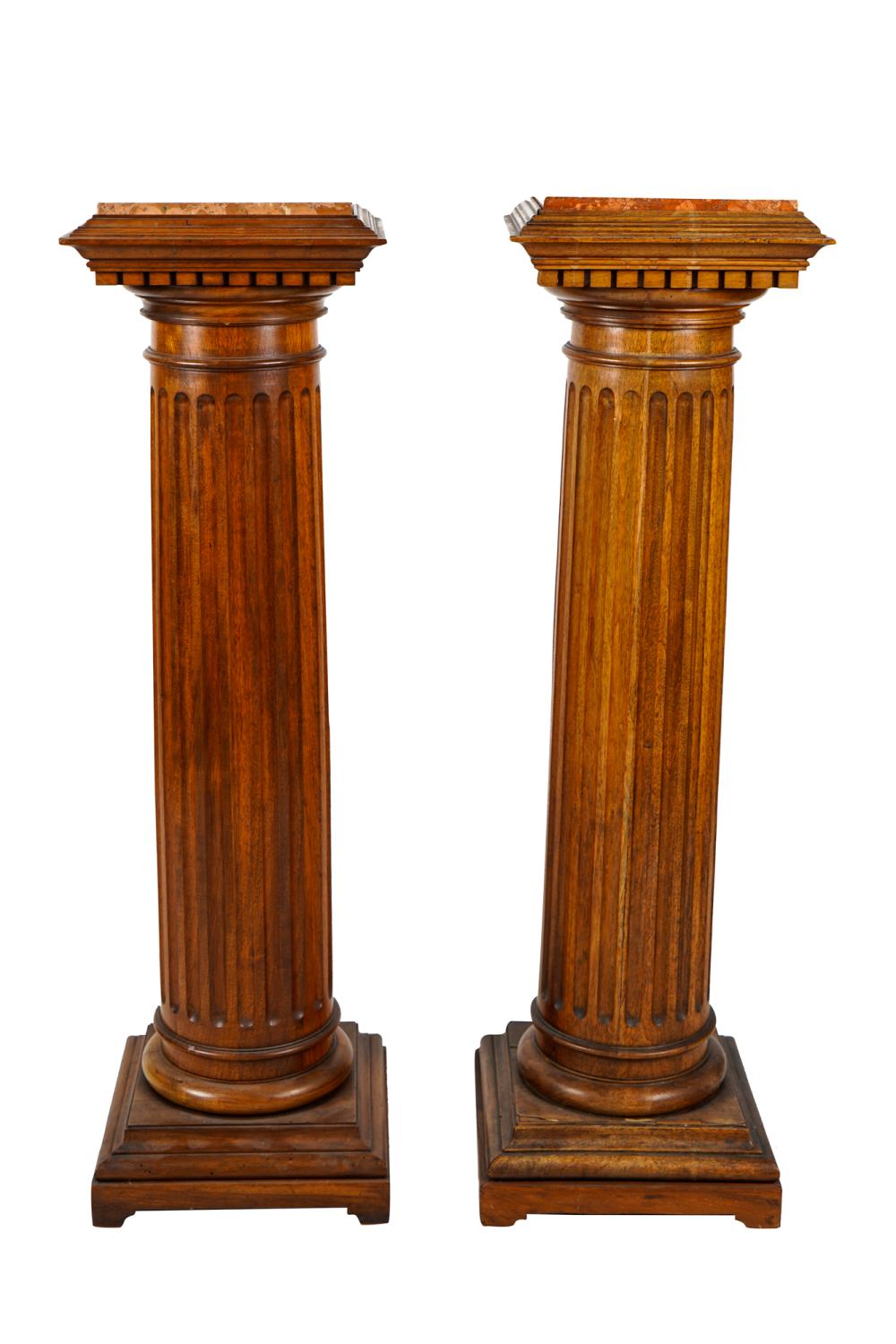 Appraisal: PAIR OF CARVED OAK COLUMNAR PEDESTALSwith square inset rouge marble