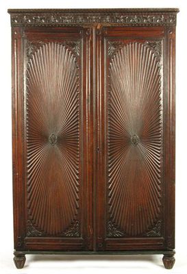 Appraisal: A th century Anglo Indian rosewood wardrobe with carved foliage