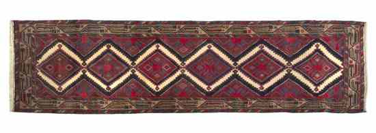 Appraisal: A Karadja Wool Runner having six geometric lozenges on a