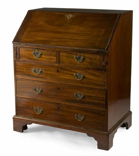 Appraisal: A George III mahogany bureau the fall front revealing a