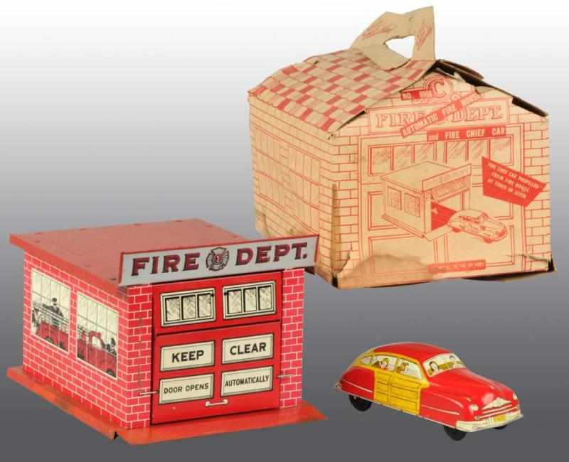 Appraisal: Tin Courtland Fire Department Car Toys Description Includes original box