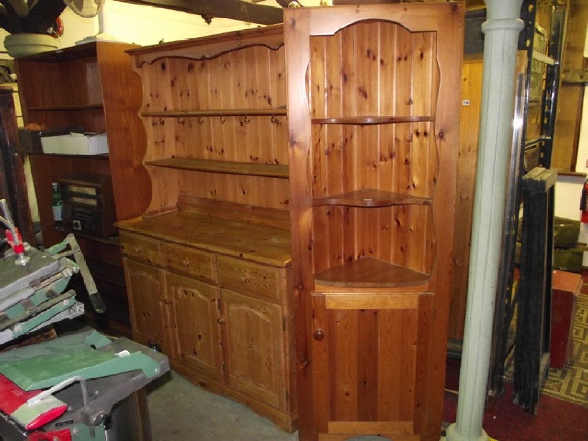 Appraisal: A modern stripped pine kitchen dresser the base enclosed by