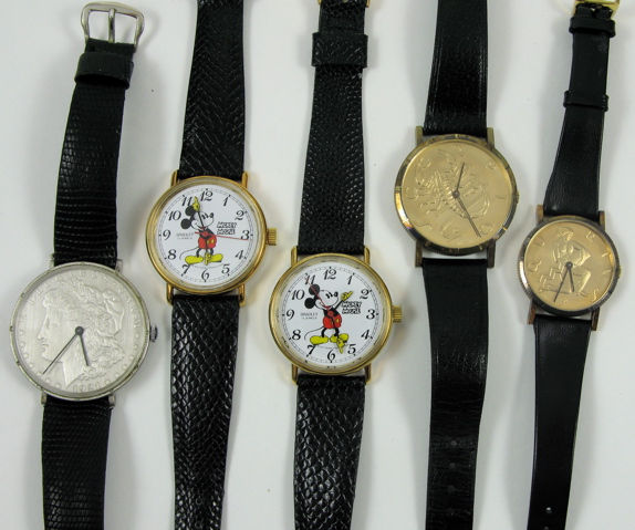 Appraisal: FIVE WRISTWATCHES AND THREE SILVER MORGAN DOLLAR PENDANT NECKLACES The