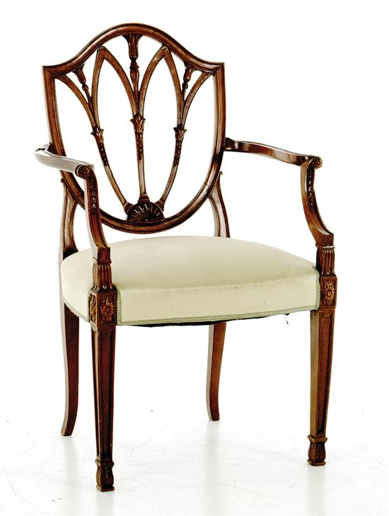 Appraisal: George III style carved mahogany shieldback armchair late th century