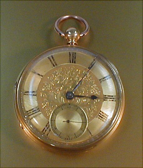 Appraisal: An open faced gold cased pocket watch with gold damascened