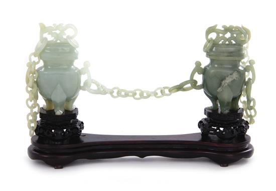 Appraisal: Chinese carved jade covered chain vases Republic period gray-green stone