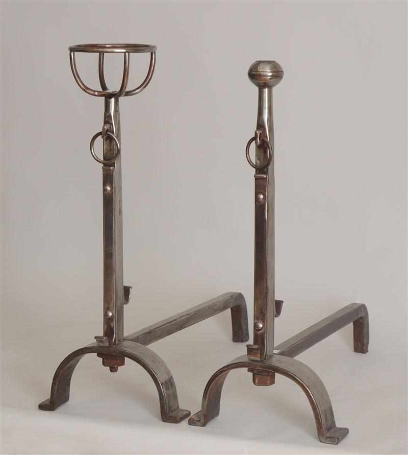 Appraisal: PAIR OF BAROQUE STYLE STEEL FIRE DOGS Each angular stem