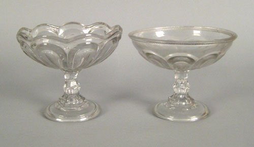 Appraisal: Two colorless glass compotes th c h dia and h