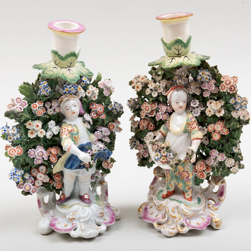 Appraisal: Pair of Chelsea Porcelain Bocage Figural Candlesticks in high Condition