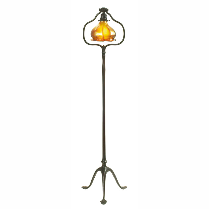 Appraisal: Tiffany Studios floor lamp bronze three footed base holding a