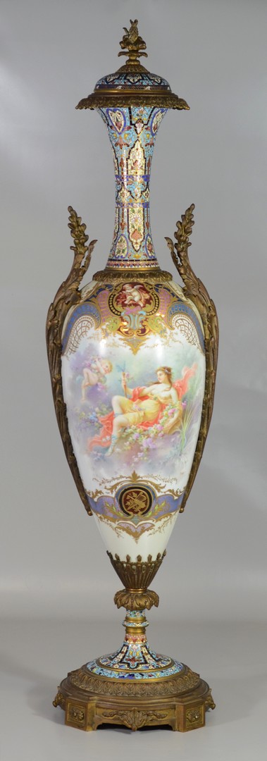 Appraisal: Sevres style porcelain and champlev urn with bronze mounts artist