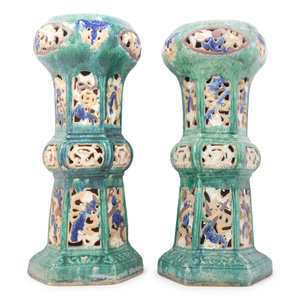 Appraisal: A Pair of Chinese Sancai Glazed Porcelain Reticulated Pedestals Height