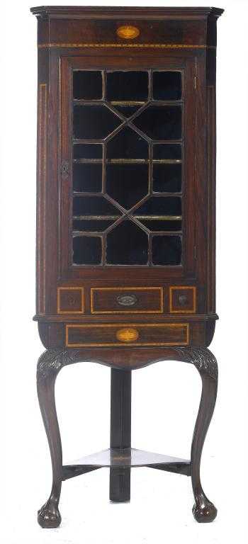 Appraisal: AN INLAID MAHOGANY SPLAY FRONTED CORNER CABINET the frieze with