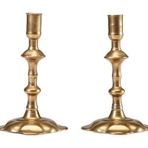 Appraisal: A Pair of English Brass Scalloped-Foot Candlesticks th Century Height