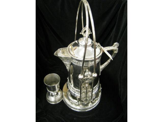 Appraisal: Pairpoint Victorian Silverplate Tilting Water Pitcher in stand goblet in