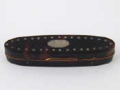 Appraisal: A tortoiseshell toothpick box with mirror and silver pique c