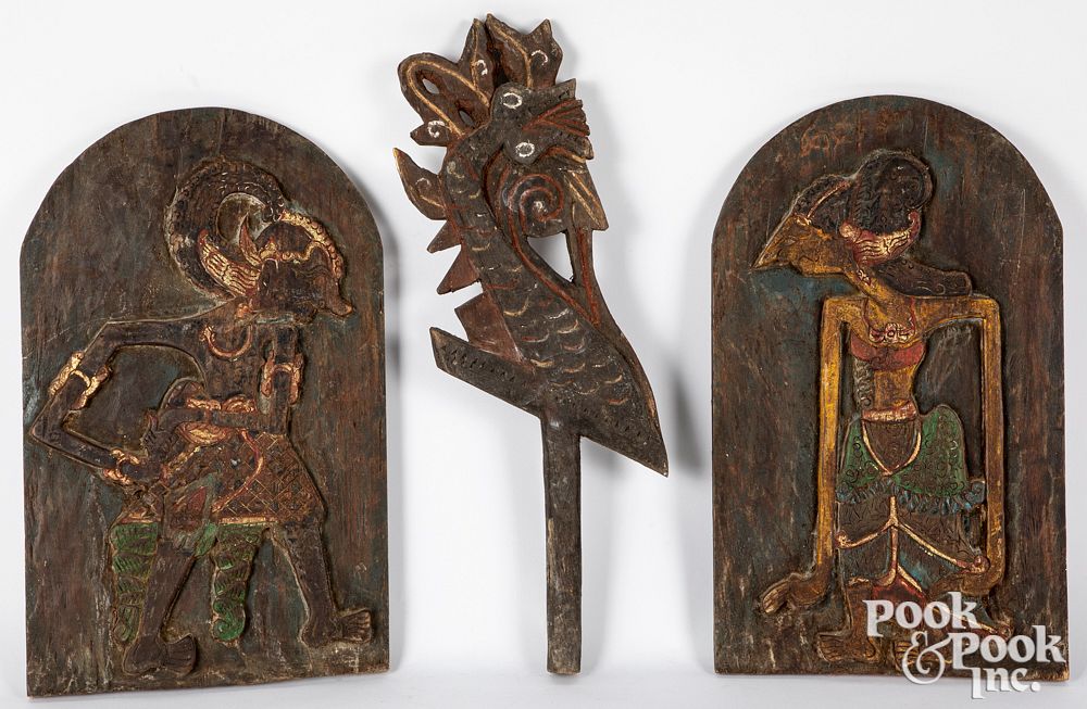 Appraisal: Pair of Sulawesi carved and painted puppet panels Pair of