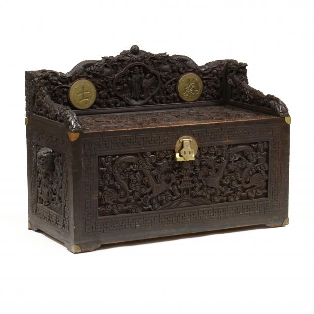 Appraisal: AN EXCEPTIONAL CHINESE CARVED STORAGE CHEST Circa very finely carved