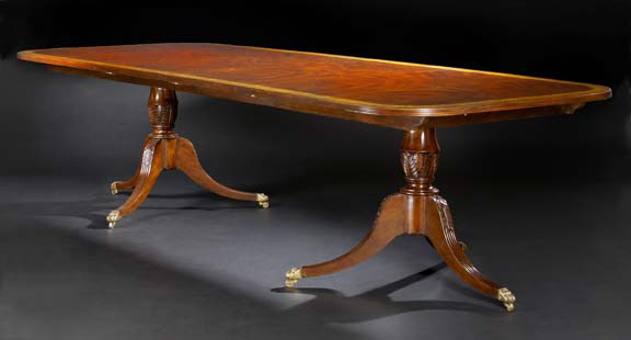 Appraisal: George III-Style Mahogany Dining Table the rounded rectangular top with