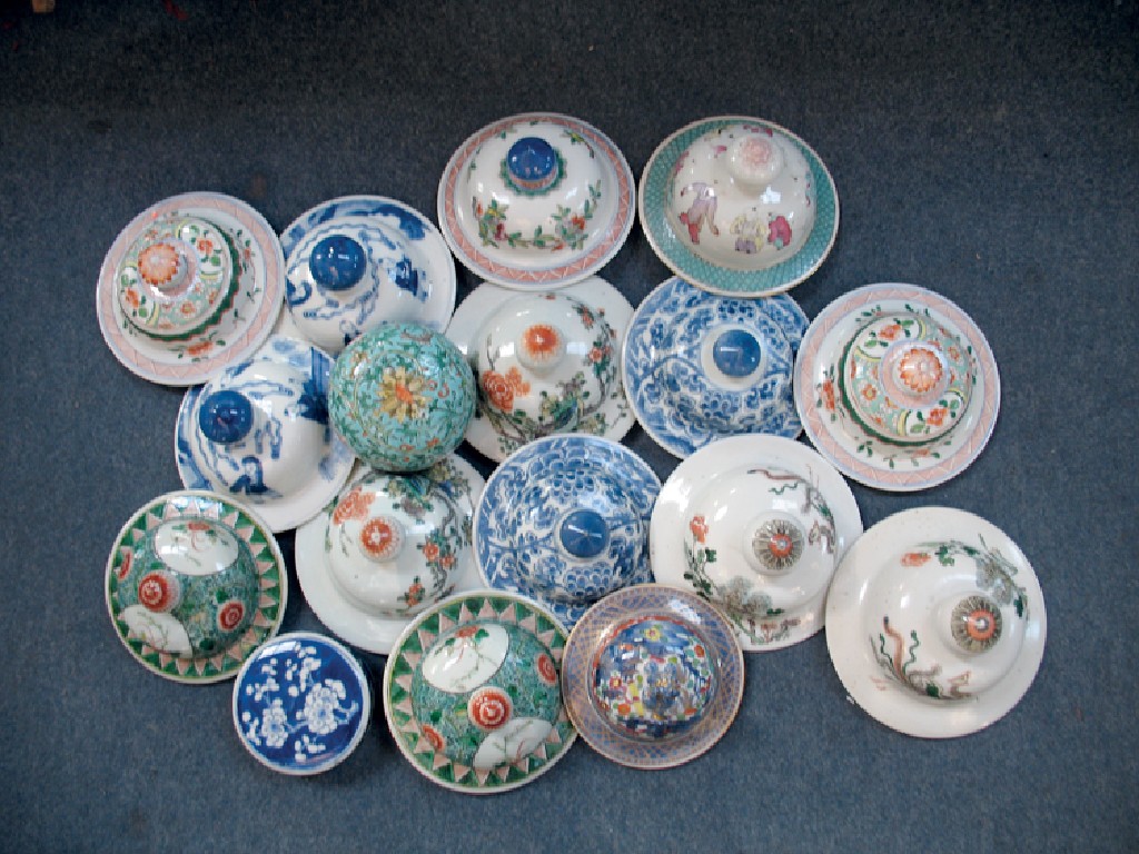 Appraisal: A COLLECTION OF CHINESE PORCELAIN VASE LIDS in famille rose