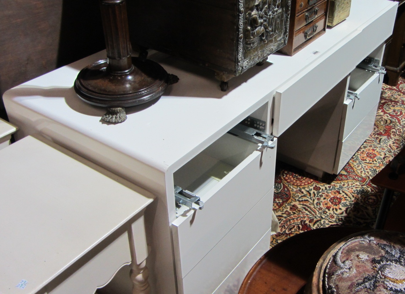 Appraisal: A th century white dressing table desk with an arrangement