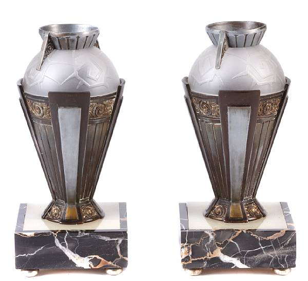 Appraisal: A pair of Art Deco silvered-metal onyx and frosted glass