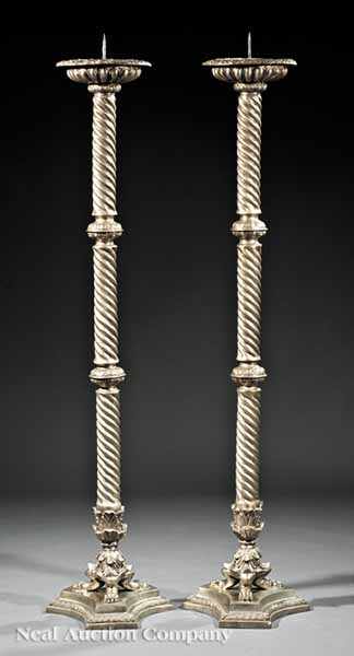 Appraisal: A Pair of Regency-Style Silvered Bronze Prickets ropetwist standards incurvate