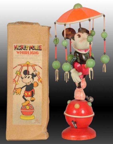 Appraisal: Japanese Celluloid Mickey Mouse Whirli-Gig Toy Description Includes rare original