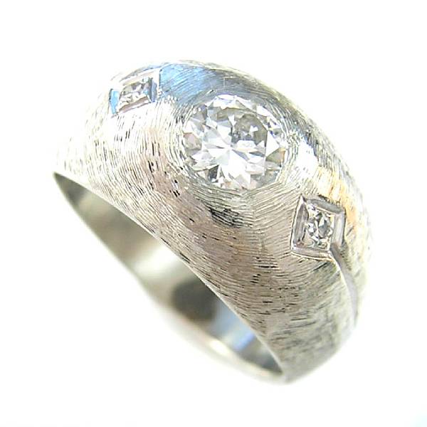 Appraisal: A three stone diamond and k white gold dome ring