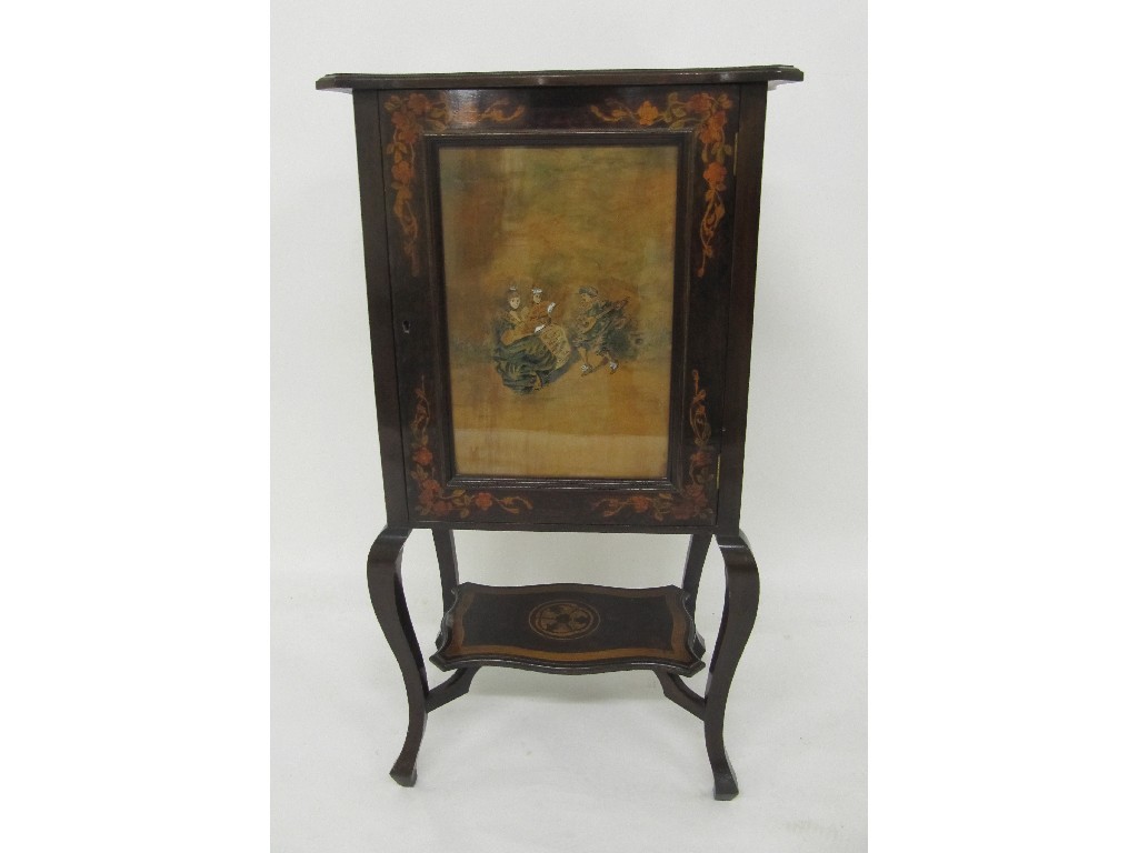 Appraisal: An Art Nouveau penwork music cabinet the glass fronted door