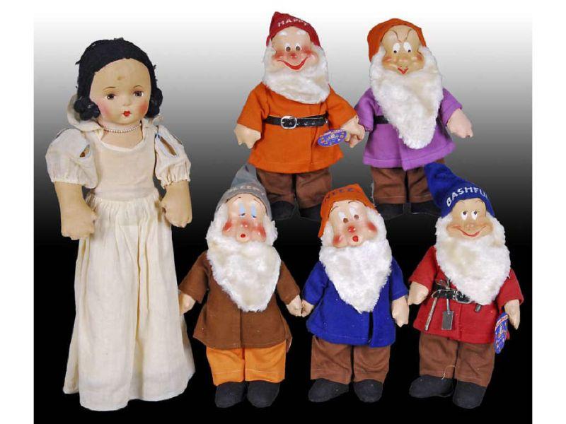 Appraisal: Ideal Snow White Doll with Dwarfs Description Four Dwarfs have