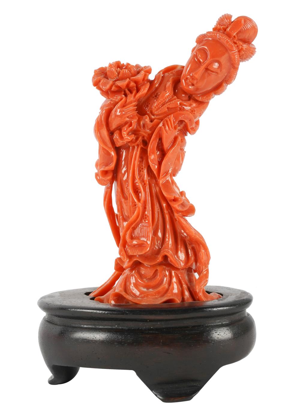 Appraisal: CHINESE CARVED CORAL QUAN YINaffixed to fitted wooden stand inches